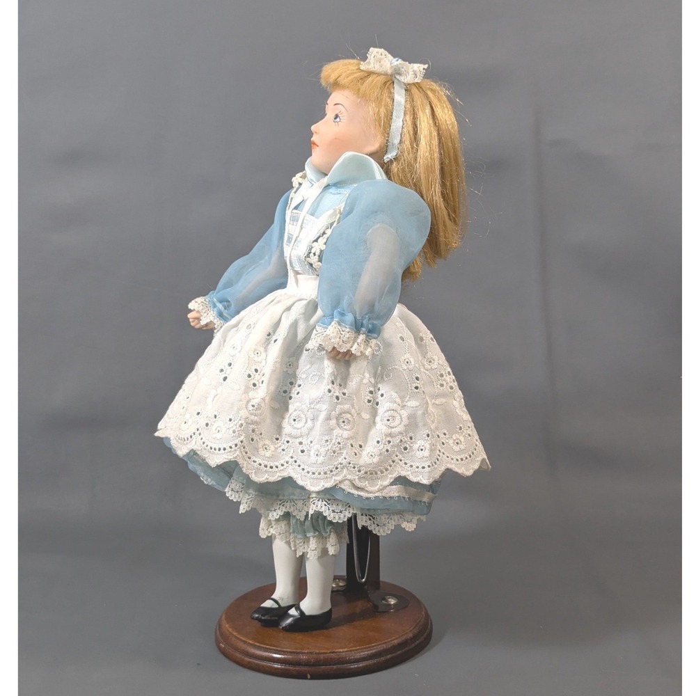 Alice in Wonderland Porcelain Doll 11.5 In. Bisque Blue Dress Eyelet Apron Stand - Picture 2 of 6